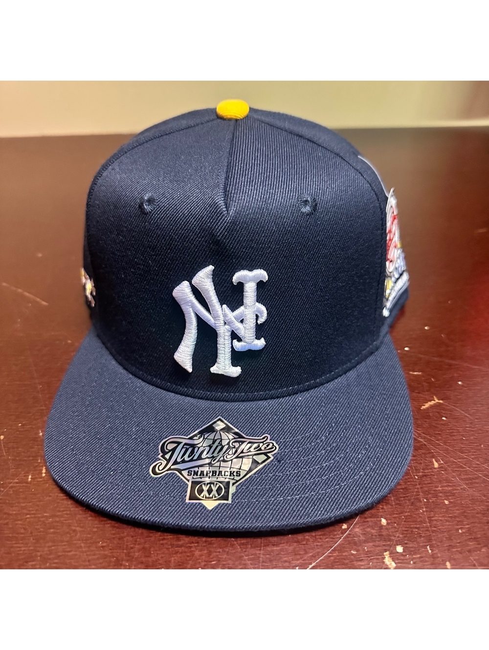 TWNTY-TWO navy Blue White, yellow New York City  PRIDE SNAPBACK HAT